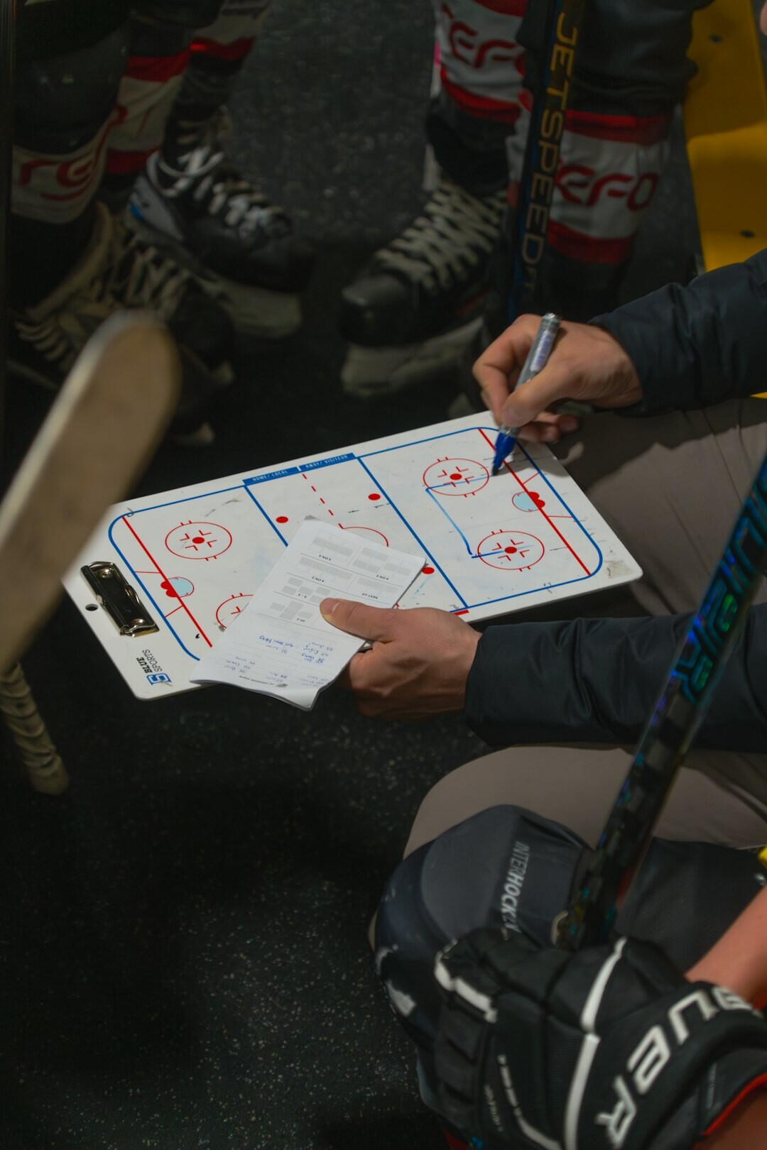 Woman reviewing a checklist during a practice session